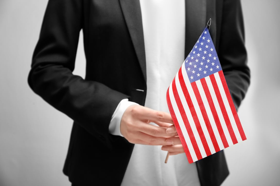 Hands Holding an American Flag